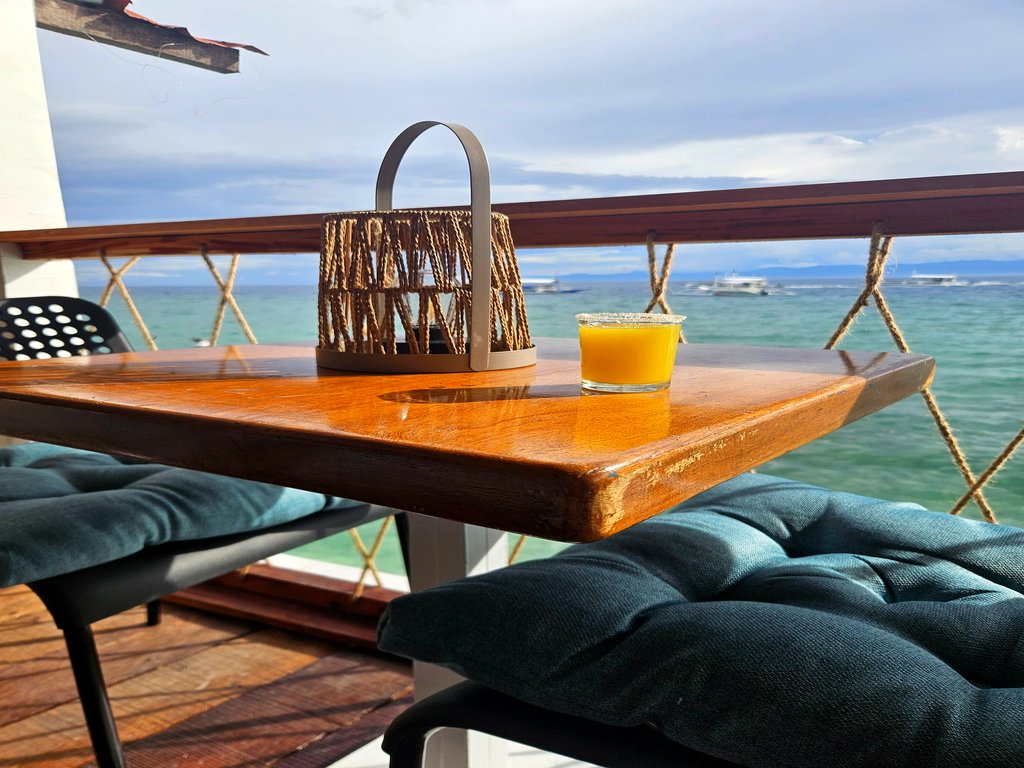 Beachfront tables at Tilas Lounge